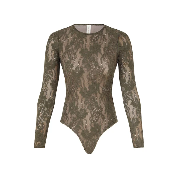 Elevate your elegance in this Zimmermann Tops available now at Coveti