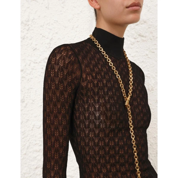 Elevate your elegance in this Zimmermann Knitwear available now at Coveti