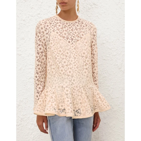 Elevate your elegance in this Zimmermann Tops available now at Coveti
