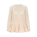 Elevate your elegance in this Zimmermann Tops available now at Coveti