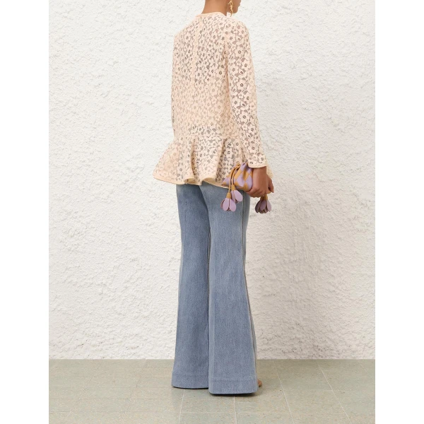 Elevate your elegance in this Zimmermann Tops available now at Coveti