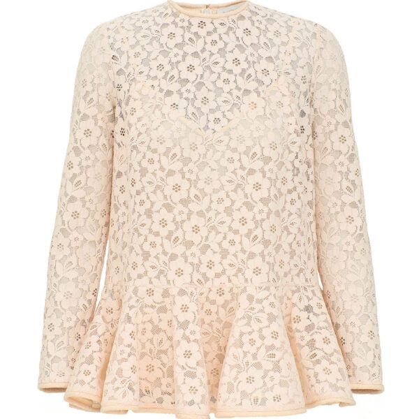 Elevate your elegance in this Zimmermann Tops available now at Coveti