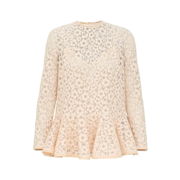 Elevate your elegance in this Zimmermann Tops available now at Coveti