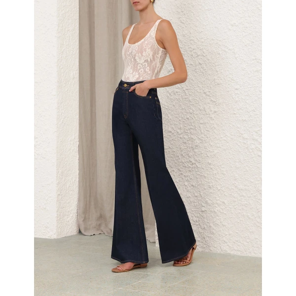 Elevate your elegance in this Zimmermann Bikini available now at Coveti