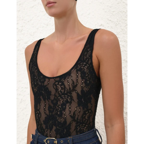 Elevate your elegance in this Zimmermann Bikini available now at Coveti