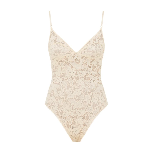 Elevate your elegance in this Zimmermann Tops available now at Coveti