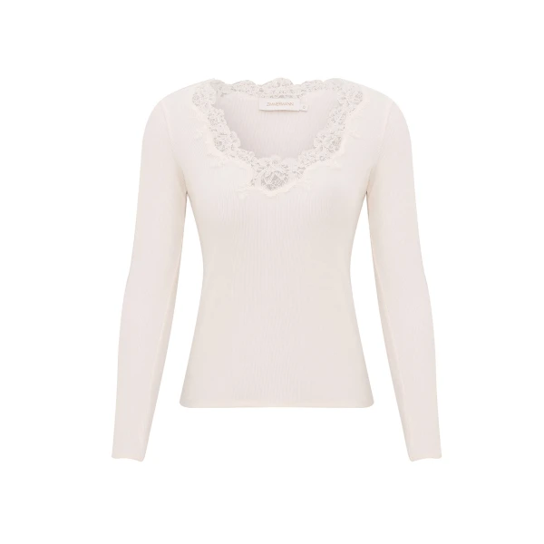 Elevate your elegance in this Zimmermann Tops available now at Coveti