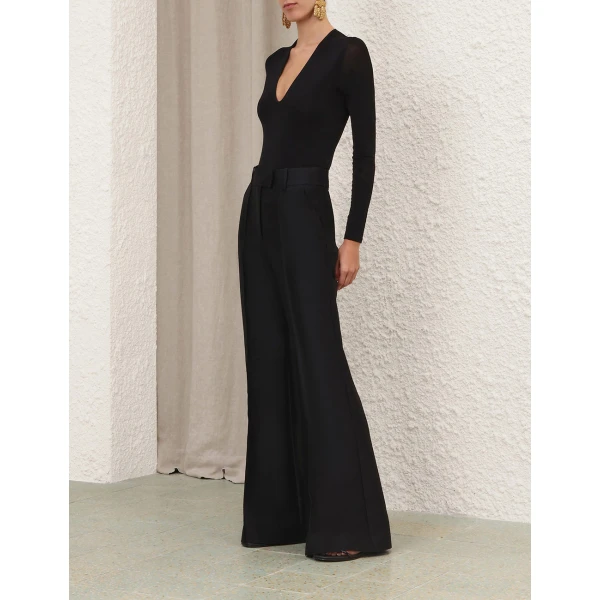 Elevate your elegance in this Zimmermann Tops available now at Coveti