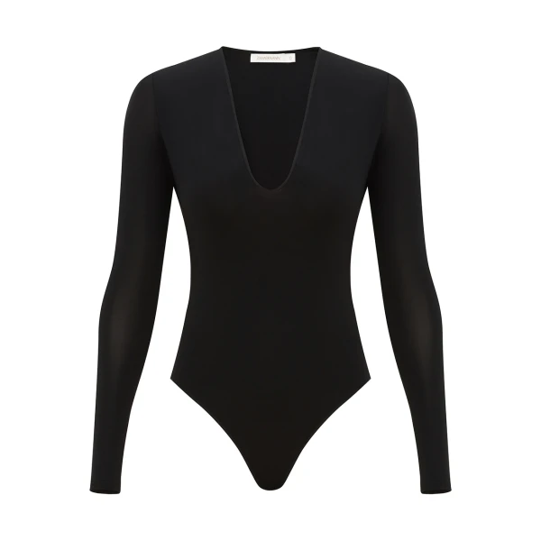 Elevate your elegance in this Zimmermann Tops available now at Coveti