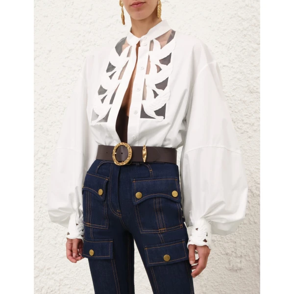 Elevate your elegance in this Zimmermann Tops available now at Coveti