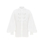 Elevate your elegance in this Zimmermann Tops available now at Coveti