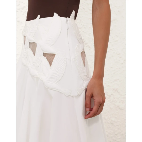Elevate your elegance in this Zimmermann Skirts available now at Coveti