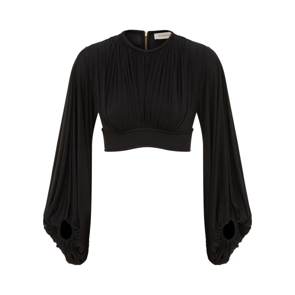 Elevate your elegance in this Zimmermann Tops available now at Coveti