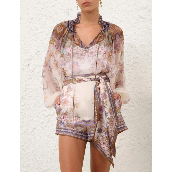 Elevate your elegance in this Zimmermann Tops available now at Coveti