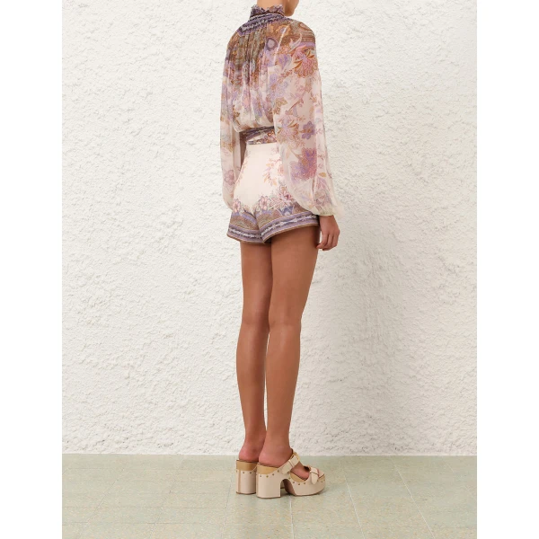 Elevate your elegance in this Zimmermann Tops available now at Coveti