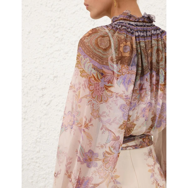 Elevate your elegance in this Zimmermann Tops available now at Coveti