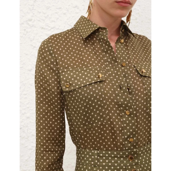 Elevate your elegance in this Zimmermann Tops available now at Coveti