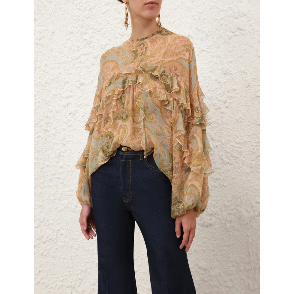 Elevate your elegance in this Zimmermann Tops available now at Coveti