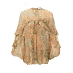 Elevate your elegance in this Zimmermann Tops available now at Coveti