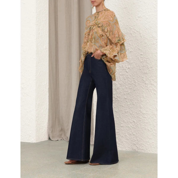 Elevate your elegance in this Zimmermann Tops available now at Coveti