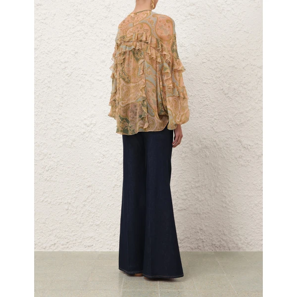 Elevate your elegance in this Zimmermann Tops available now at Coveti