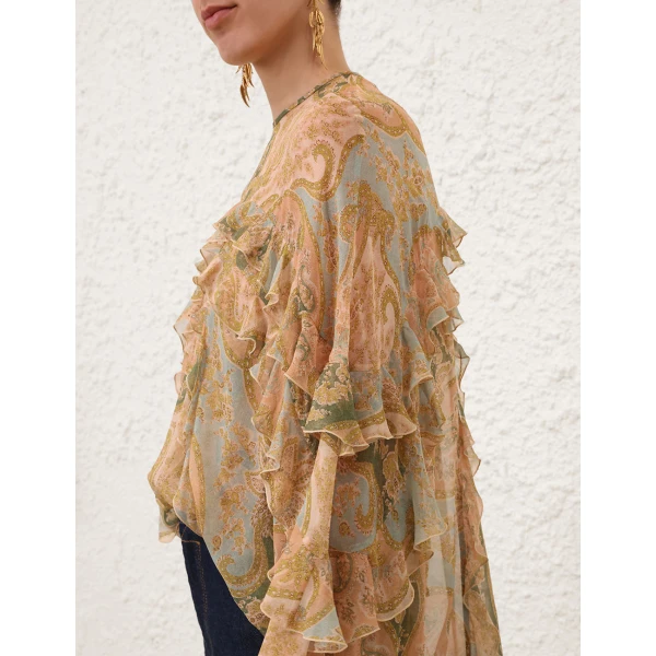 Elevate your elegance in this Zimmermann Tops available now at Coveti