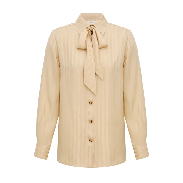 Elevate your elegance in this Zimmermann Tops available now at Coveti