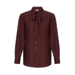 Elevate your elegance in this Zimmermann Tops available now at Coveti