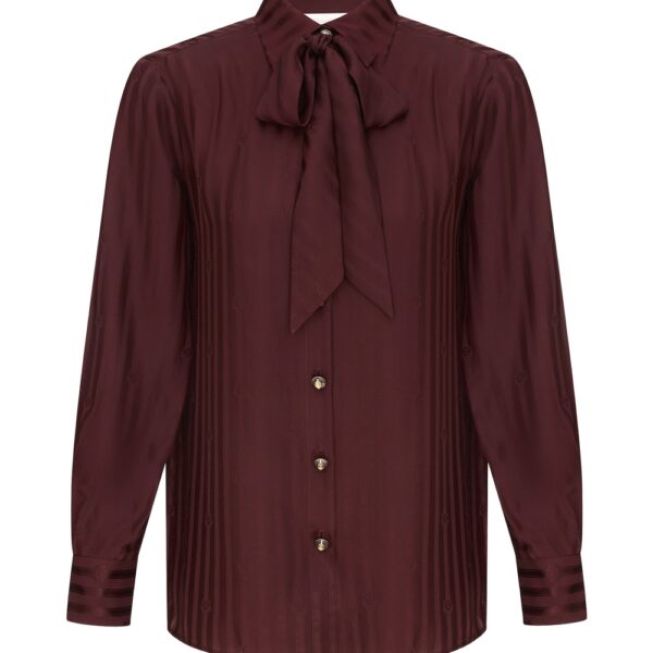 Elevate your elegance in this Zimmermann Tops available now at Coveti