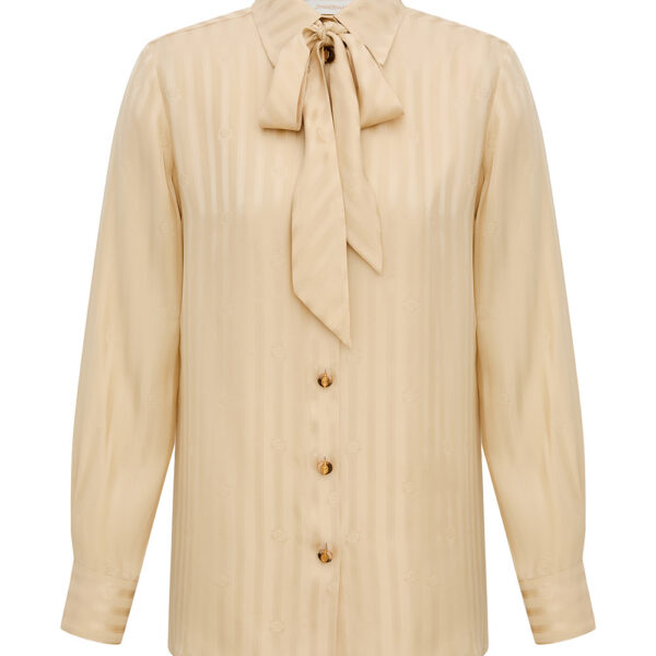 Elevate your elegance in this Zimmermann Tops available now at Coveti