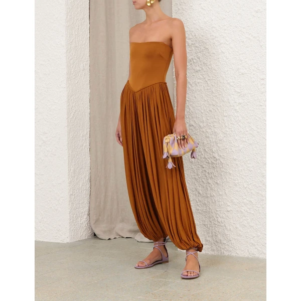 Elevate your elegance in this Zimmermann Jumpsuit available now at Coveti