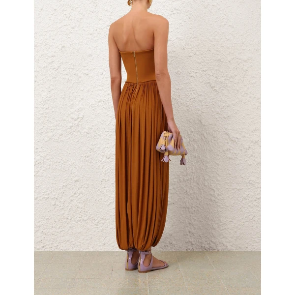 Elevate your elegance in this Zimmermann Jumpsuit available now at Coveti