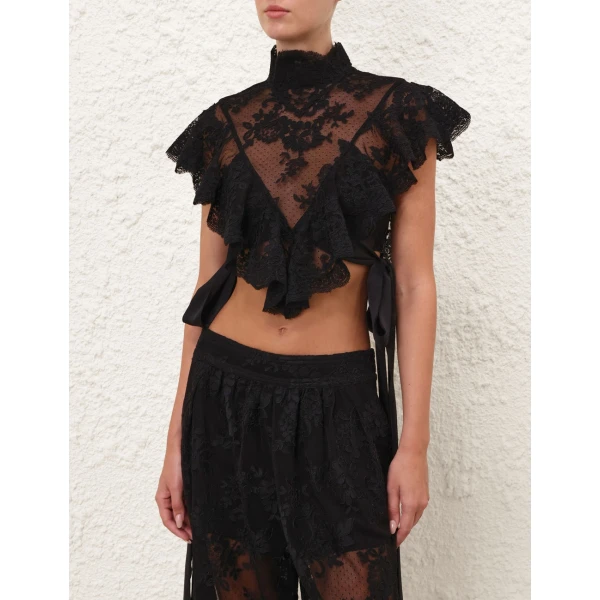 Elevate your elegance in this Zimmermann Tops available now at Coveti