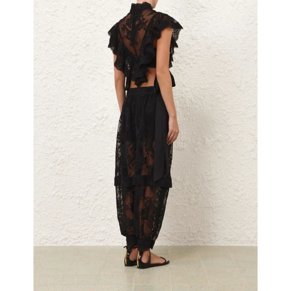 Elevate your elegance in this Zimmermann Tops available now at Coveti