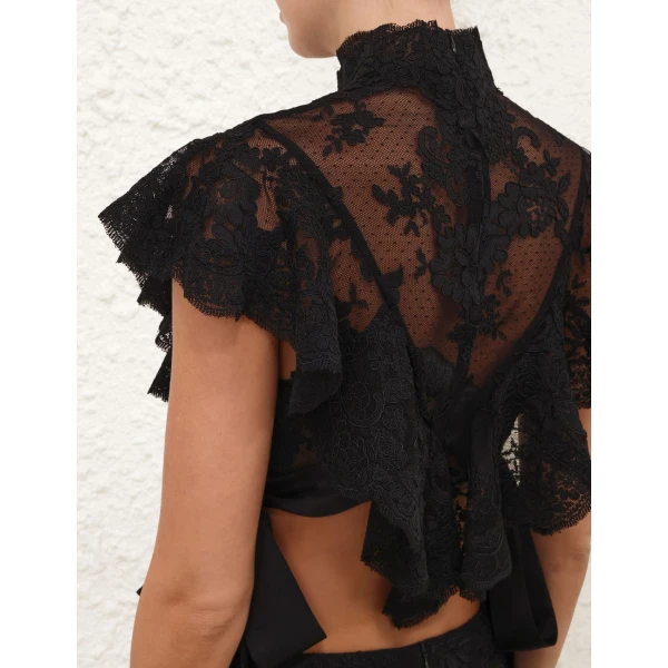 Elevate your elegance in this Zimmermann Tops available now at Coveti