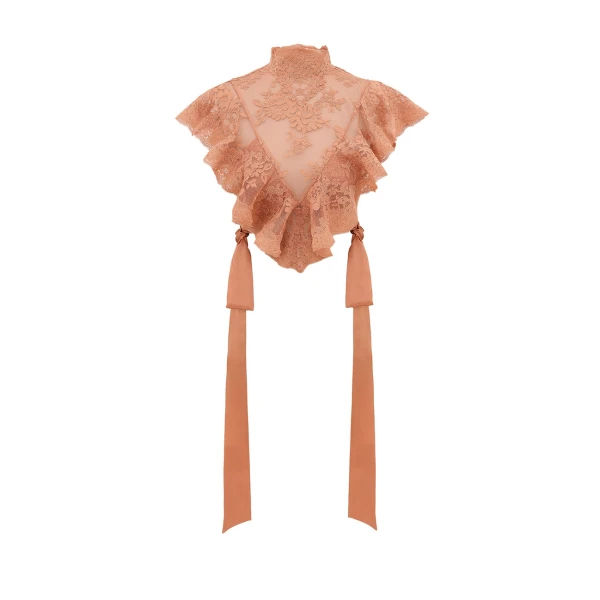 Elevate your elegance in this Zimmermann Tops available now at Coveti