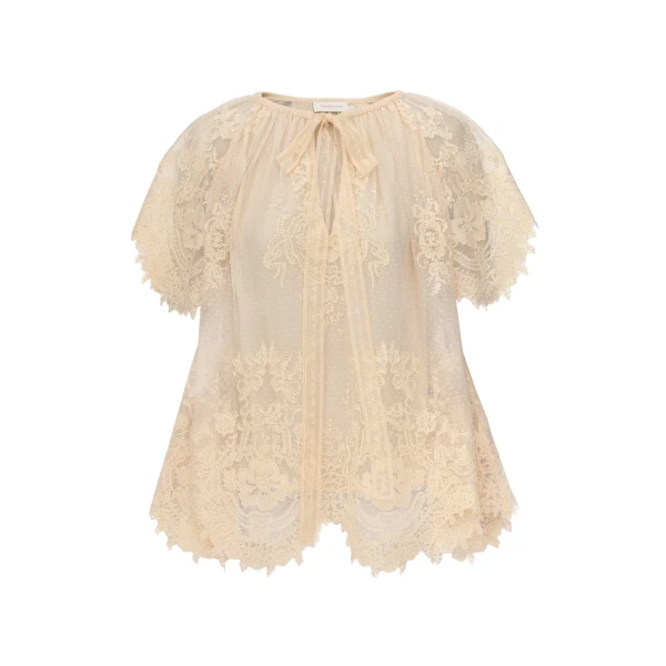 Elevate your elegance in this Zimmermann Tops available now at Coveti
