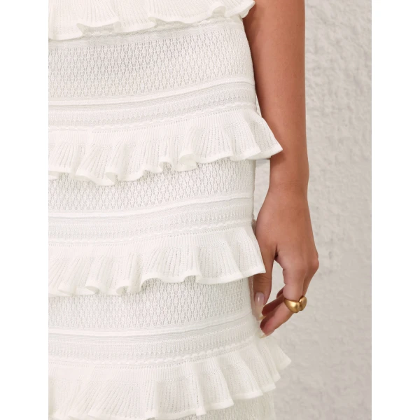 Elevate your elegance in this Zimmermann Skirts available now at Coveti