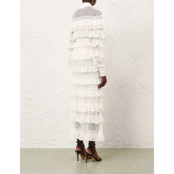 Elevate your elegance in this Zimmermann Tops available now at Coveti