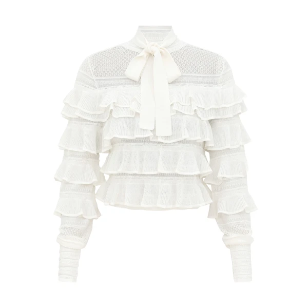 Elevate your elegance in this Zimmermann Tops available now at Coveti