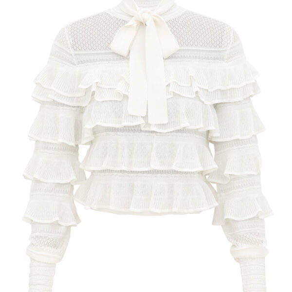 Elevate your elegance in this Zimmermann Tops available now at Coveti