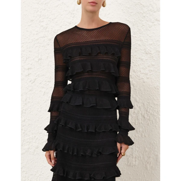 Elevate your elegance in this Zimmermann Tops available now at Coveti