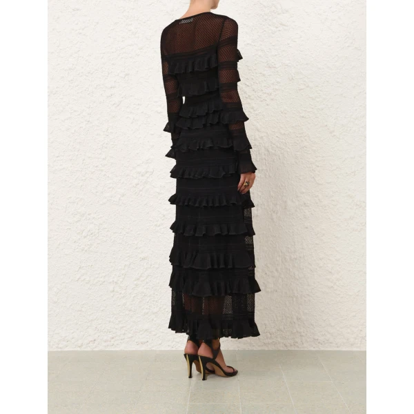 Elevate your elegance in this Zimmermann Tops available now at Coveti