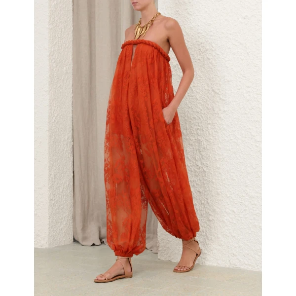 Elevate your elegance in this Zimmermann Jumpsuit available now at Coveti