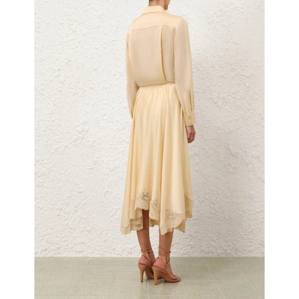 Elevate your elegance in this Zimmermann Tops available now at Coveti