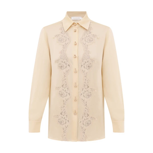 Elevate your elegance in this Zimmermann Tops available now at Coveti
