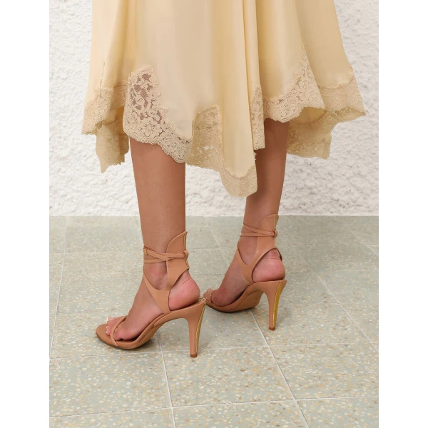 Elevate your elegance in this Zimmermann Skirts available now at Coveti