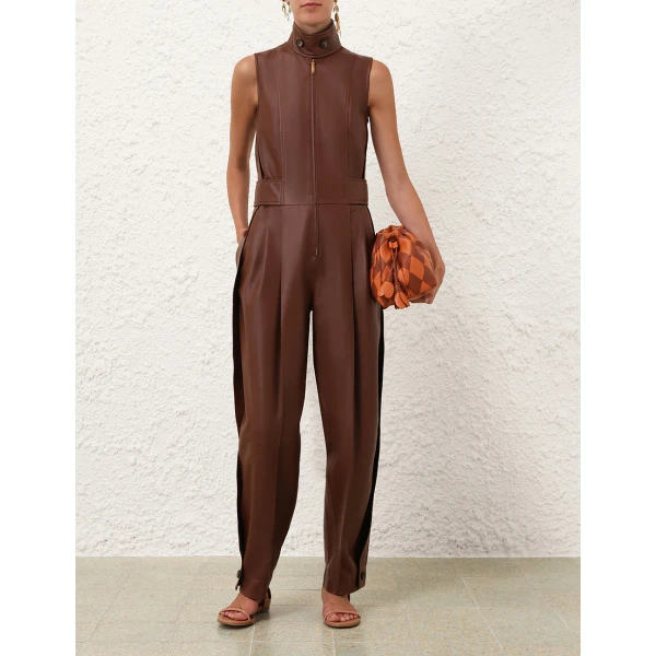 Elevate your elegance in this Zimmermann Jumpsuit available now at Coveti