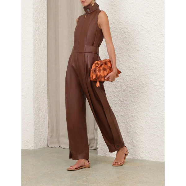 Elevate your elegance in this Zimmermann Jumpsuit available now at Coveti