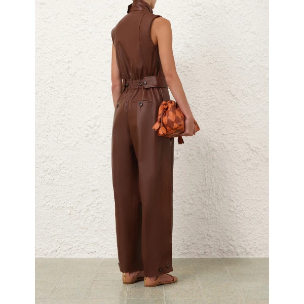 Elevate your elegance in this Zimmermann Jumpsuit available now at Coveti